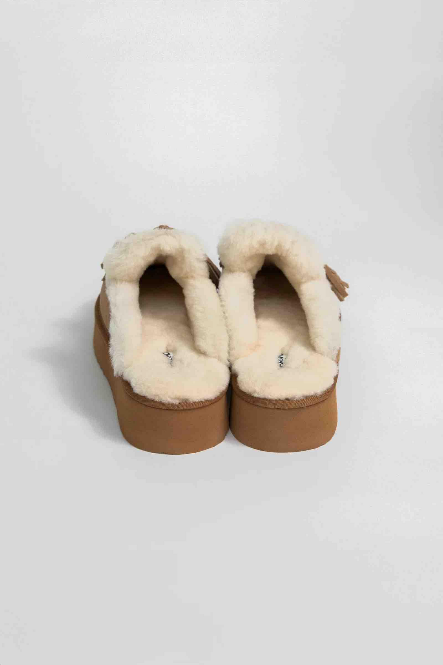 ANITA SUEDE AND SHEEPSKIN MULES WITH POM-POMS - CAMEL