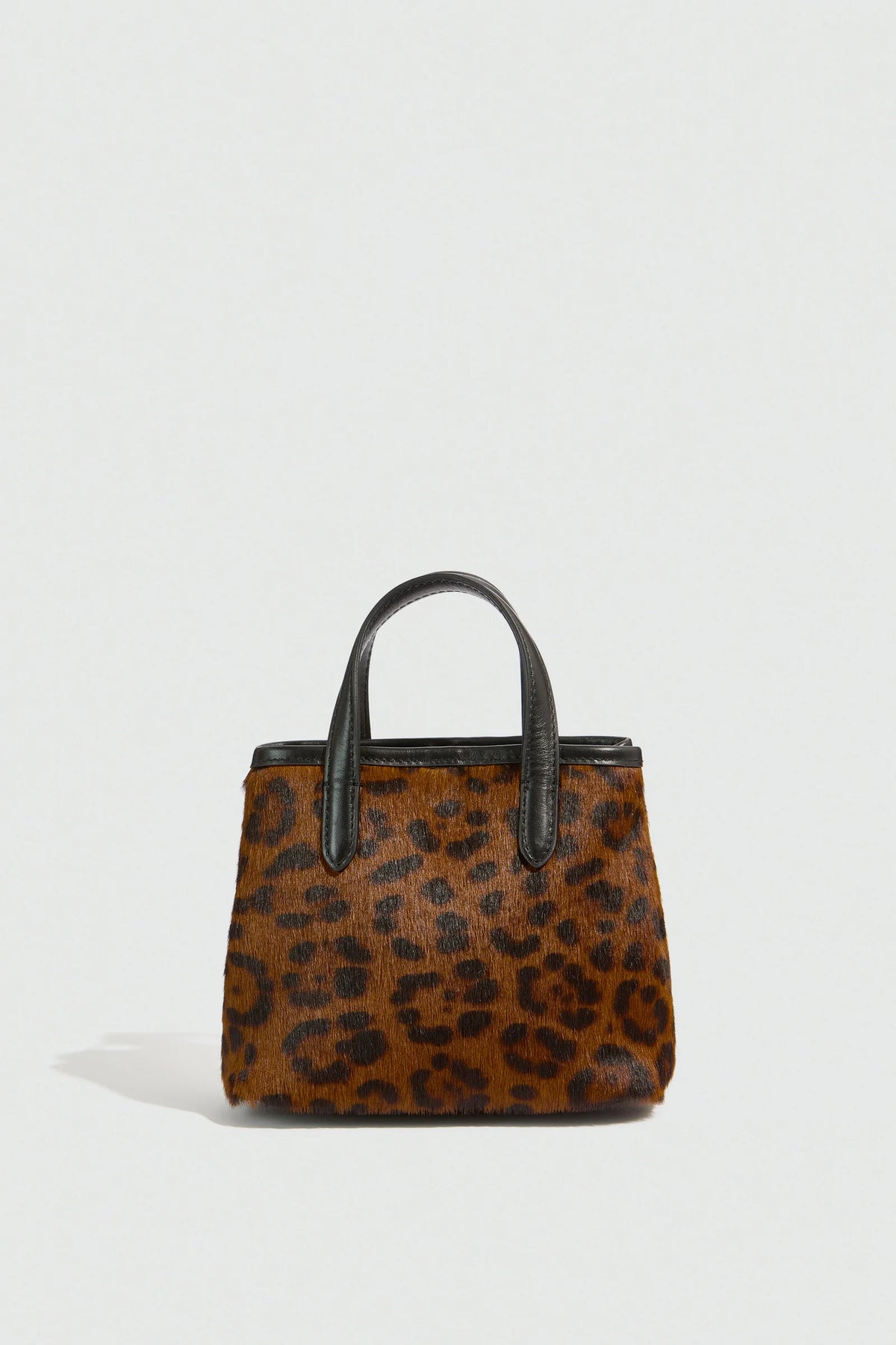 ANIMAL PRINT COW HIDE BAG - CAMEL/BLACK SPOTTED