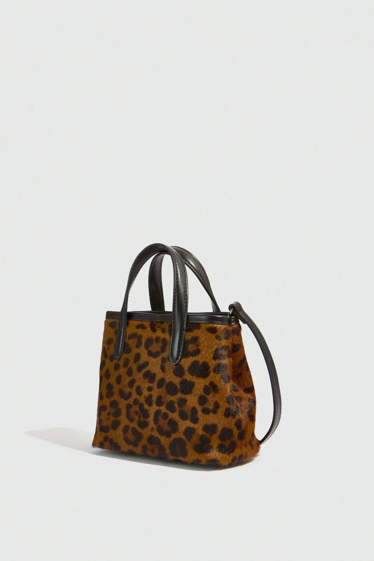 ANIMAL PRINT COW HIDE BAG - CAMEL/BLACK SPOTTED