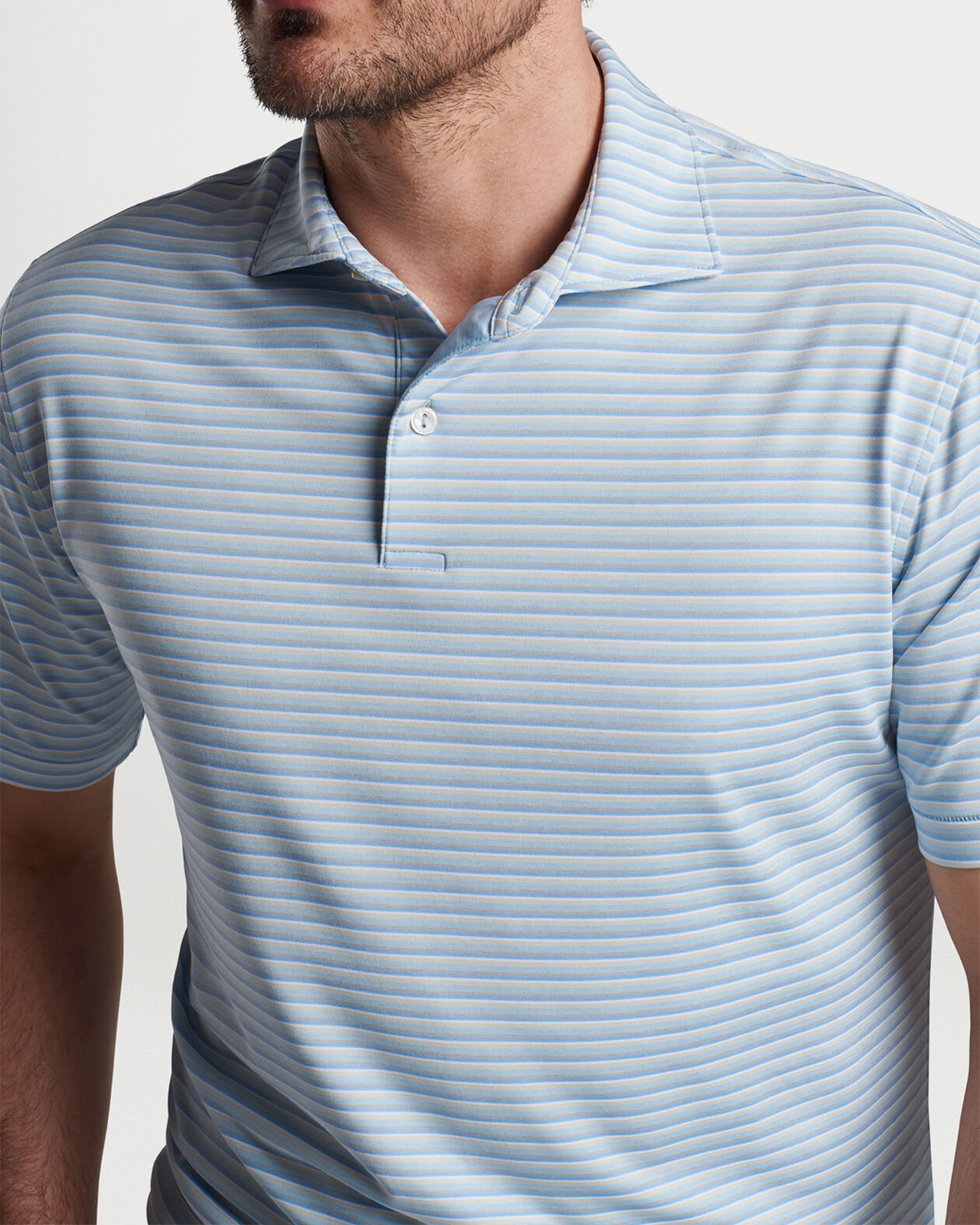 MCCRAVEN PERFORMANCE JERSEY POLO - BLUE FROST