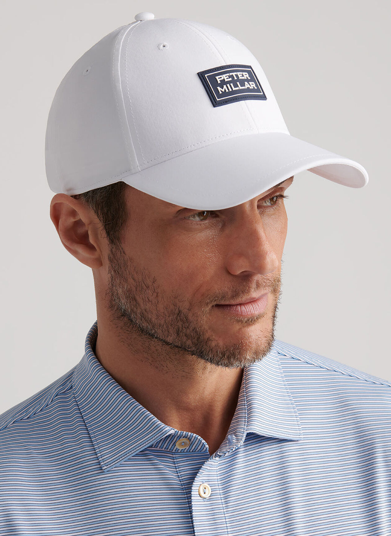 PURSUIT PERFORMANCE STACKED LOGO HAT - WHITE