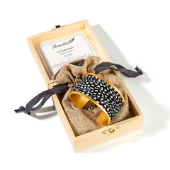 COURTNEY WIDE CUFF FEATHER BRACELET