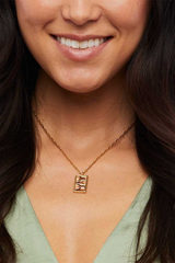 TINI FEATHER NECKLACE